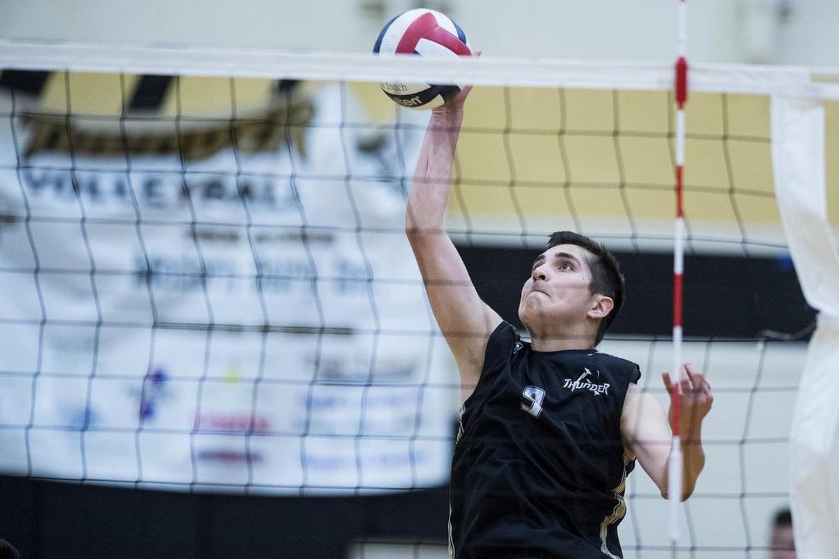 Buhach Colony senior Oscar Ramos (9) hits the ball during a match against Golden Valley at Buhach Colony High School in Atwater, Calif., on Thursday, April 26, 2018. The Cougars beat the Thunder 3-0.