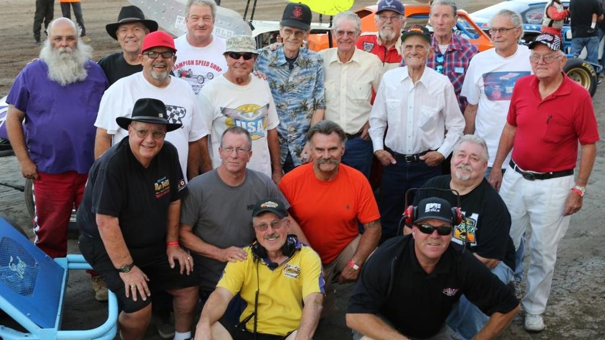 LEGENDS OF MERCED 2016 - Merced Speedway Race Director Doug Williams, front left, and speedway owner Ed Parker, front right, pose with last year's "Legends of Merced Speedway" Honorees - drivers representing the last 50 years of racing at the speedway. Saturday, August 13, 2016. Staff photo by Mike Adaskaveg.