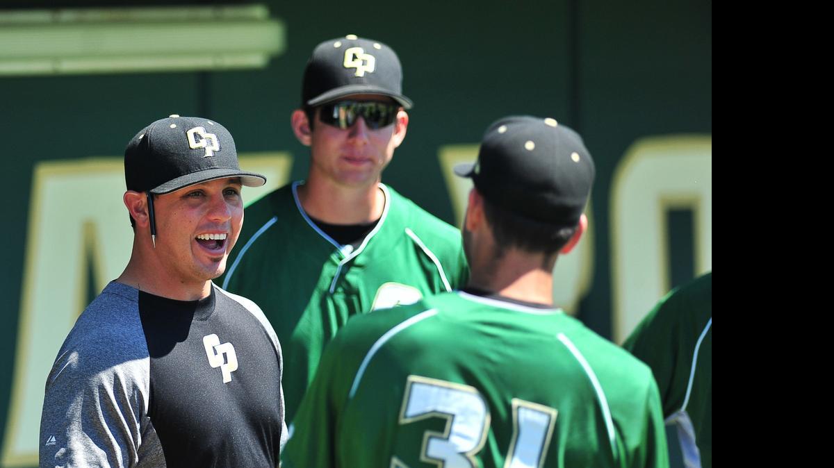 
Thomas Eager, left, was hired as the pitching coach at Cal on Monday. Eager graduated from Merced High in 2004. 
