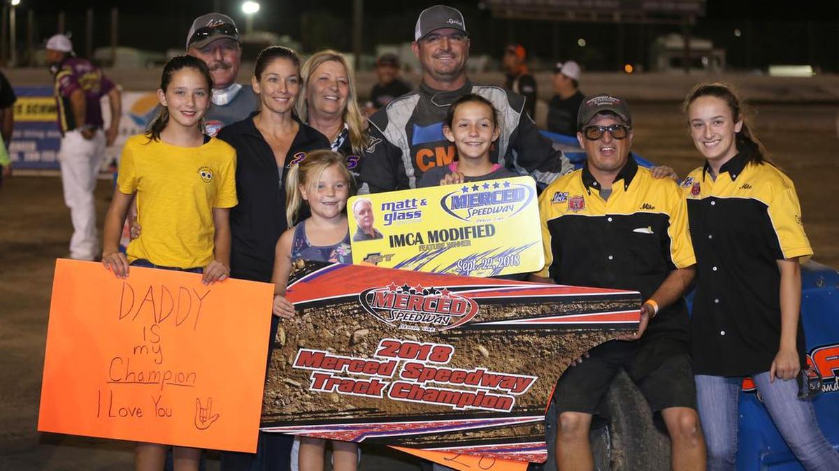 2018 IMCA Modified Champion Darrell Hughes of Manteca celebrates a win and the championship last week at Merced Speedway. Hughes is expecting tough competition from visiting drivers at the John Fore Dirt Nationals Friday and Saturday Night. (Mike Adaskaveg Photo)