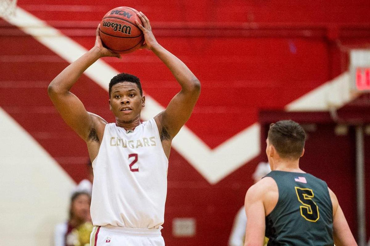 Golden Valley senior Etrell Bowers (2) looks to pass the ball during a game against El Capitan at Golden Valley High School in Merced, Calif., on Wednesday, Jan. 23, 2019.