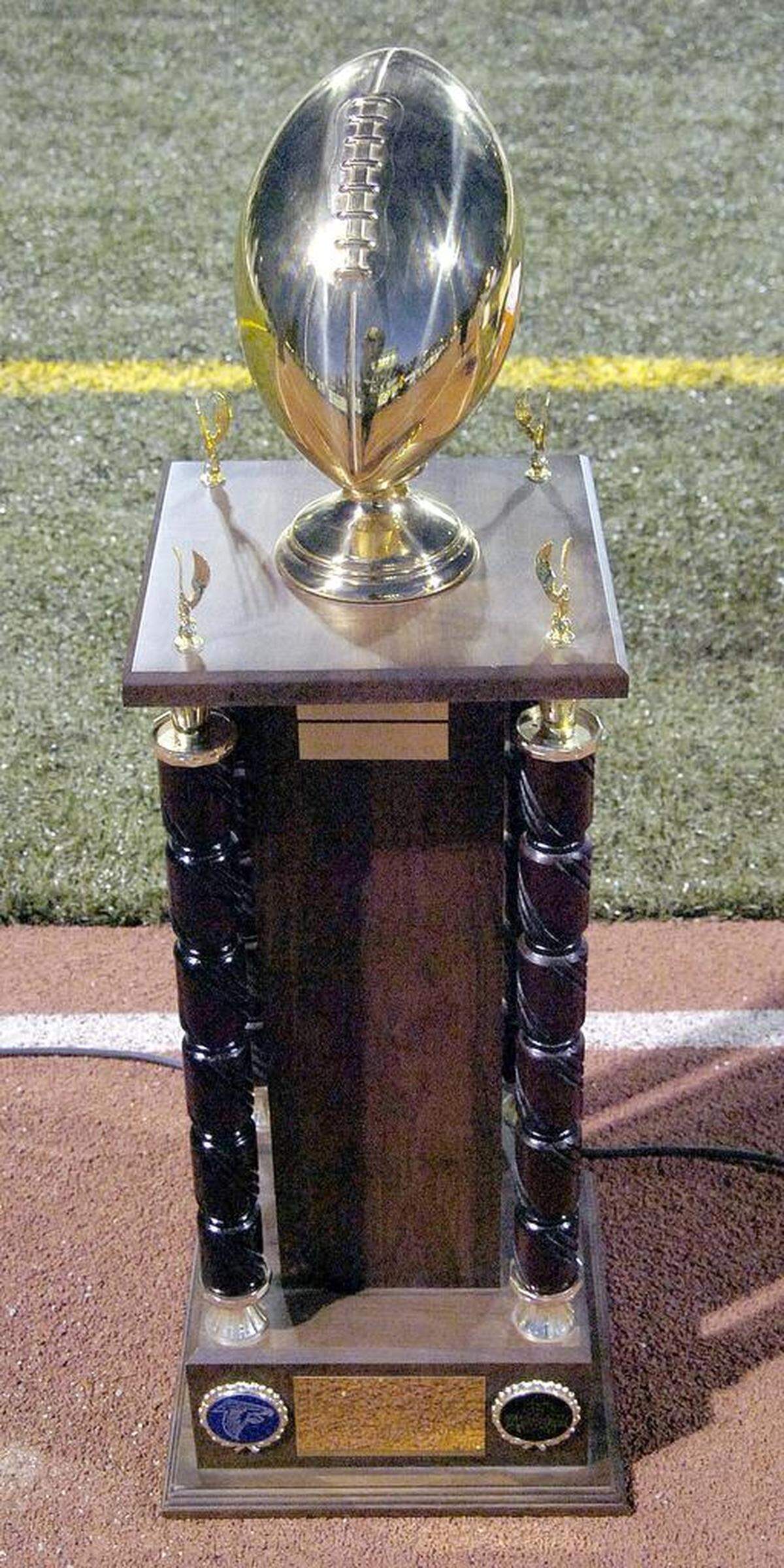 SUN-STAR PHOTO BY MARCI STENBERG The Bloss Bowl trophy goes to the winner of the Atwater/Buhach game on Friday night.