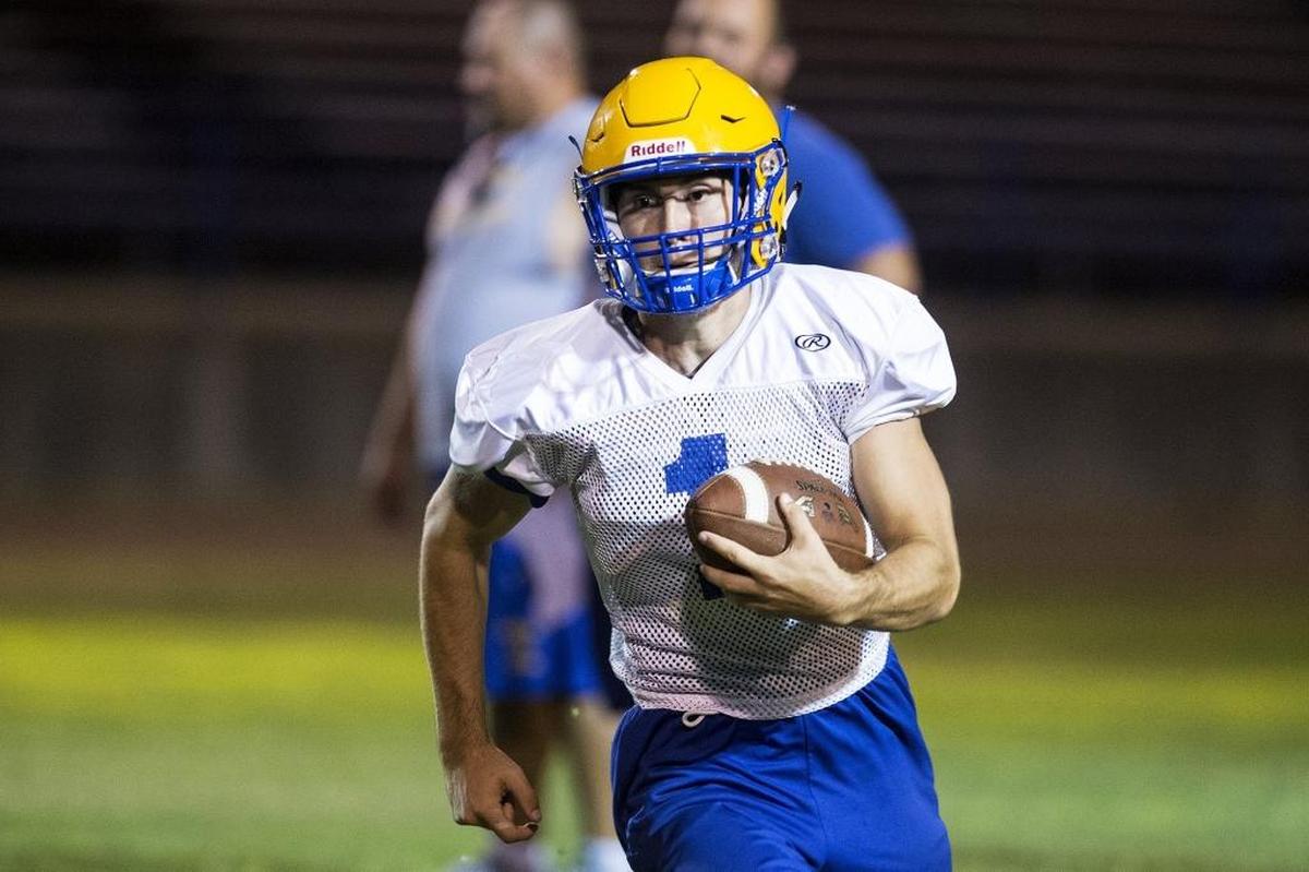 “I like the transition,” Dos Palos’ Isaac Adams says of his switch from running back to quarterback this season for the Broncos. “There’s more room to run.”