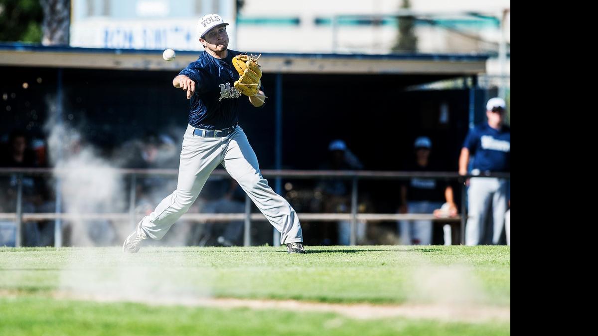 
Merced Volunteers pitcher Carlo Del Real (7) throws to first base during a game against Ed Stewart Post 803 in the American Legion Area 3 Baseball Tournament at Merced College in Merced on July 24.
