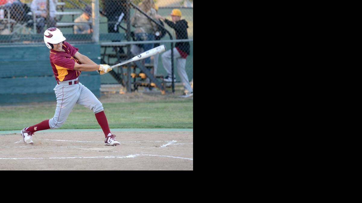 
Los Banos shortstop DJ Lomelli grounds out to short in the first inning of Wednesday's 5-4 victory over Livingston.
