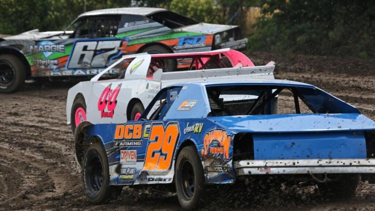 Garrett Corn of Catheys Valley moves in on Josh Strickland (44) and Michael Shearer (67J) during Hobby Stock action at Merced Speedway. On Saturday, July 1, 2017, there will be special bonuses for Hobby Stock drivers in memory of Tim Post.