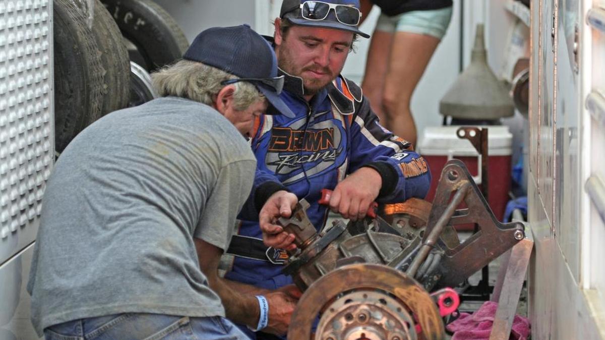 Chowchilla’s Randy Brown at work in his trailer, rebuilding a race car rear end. Brown and his family travel the country to race. They will be home to race at Merced Speedway on Saturday night, where Brown in second in the IMCA Modified Championship standings.