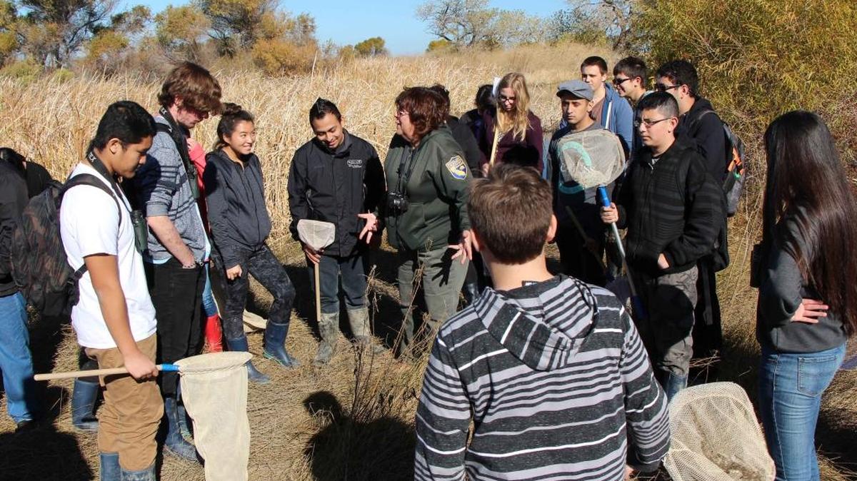 Local high school students on a field trip to a local refuge where they learned about local species and ecosystems. This refuge is a great destination for school groups because it is the home of the Grasslands Environmental Education Center.