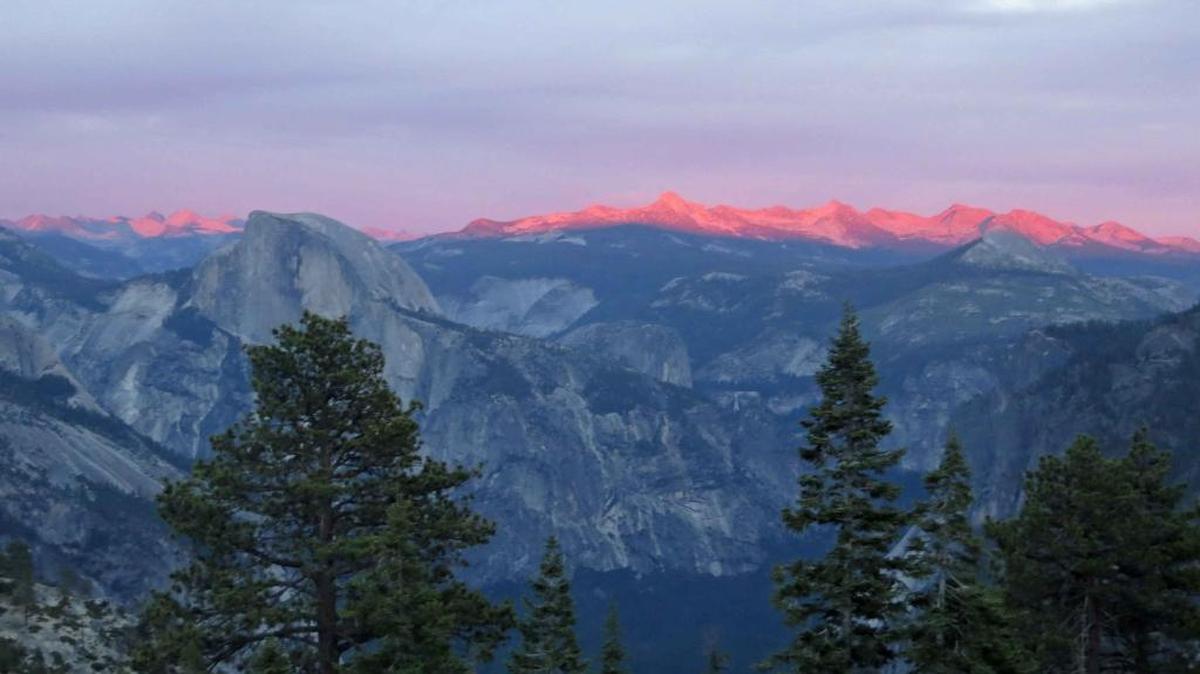 
A view of the Alpenglow on Half Dome and the Clark Range.
