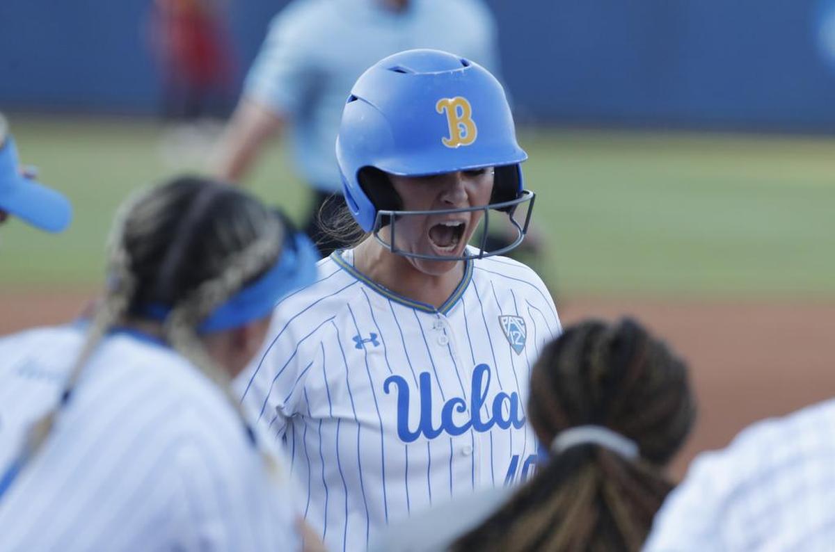 UCLA’s Bubba Nickles celebrates after hitting a home run against Oklahoma during the first inning of Game 2 of the best-of-three championship series in the NCAA softball Women’s College World Series in Oklahoma City, Tuesday, June 4, 2019. (AP Photo/Alonzo Adams)