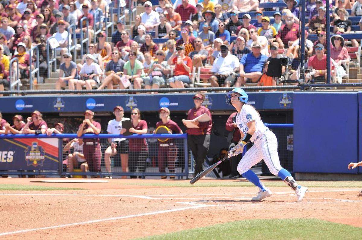 UCLA junior Madilyn “Bubba” Nickles watches her home run fly over the wall in left field during the first inning against Minnesota on Thursday, May 30, 2019 at the College World Series.