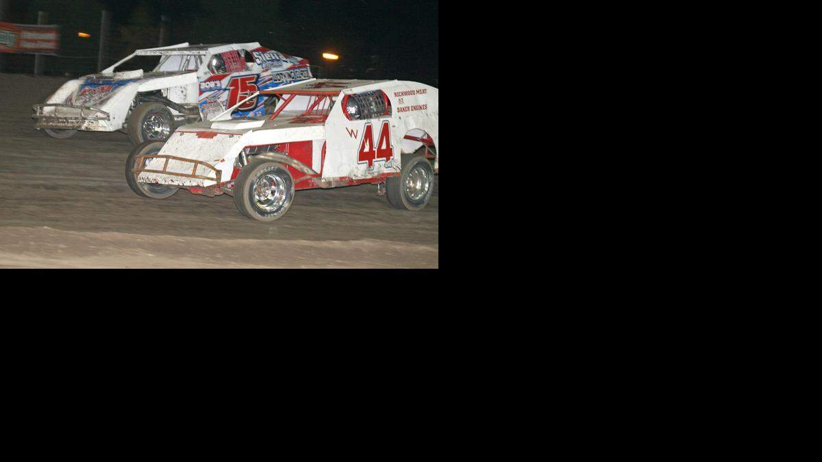
Paul Stone (44) of Winton passes Bill Egleston of Atwater last month at Merced Speedway. Stone, who went on to take second in the race, will be back behind the wheel of Mounce’s car on Saturday night at the speedway.


