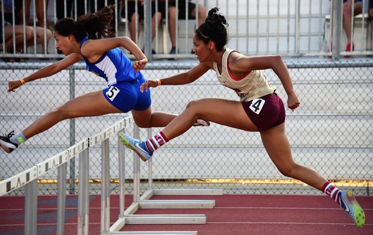 Golden Valley High senior Angelena Williams competes in the 100-meter hurdles. Williams finished third to qualify for next week’s Sac-Joaquin Section Masters Meet at UC Davis.