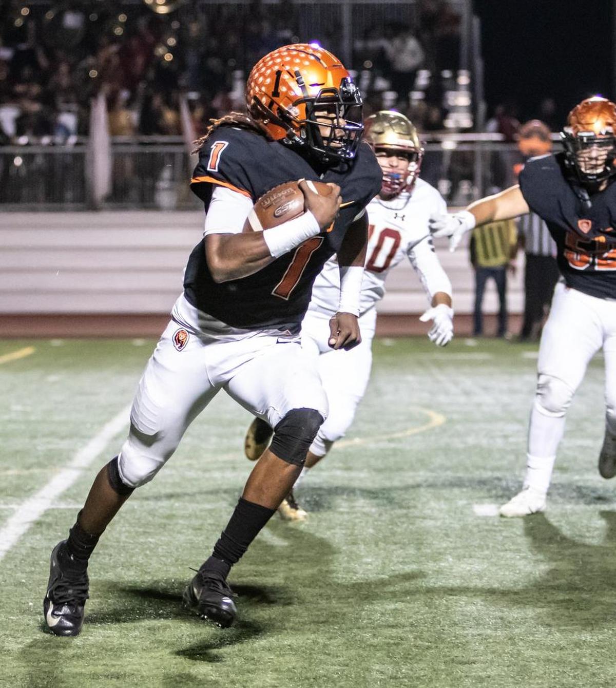 Merced quarterback Dhameer Warren runs the ball during the Bears’ 41-7 win in the 25th annual Battle for the Mayor’s Cup against Golden Valley on Friday, Oct. 26, 2018 at Veterans Stadium in Merced, Calif.